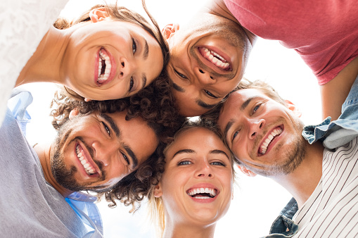 group of young college students without Grillz taking a selfie