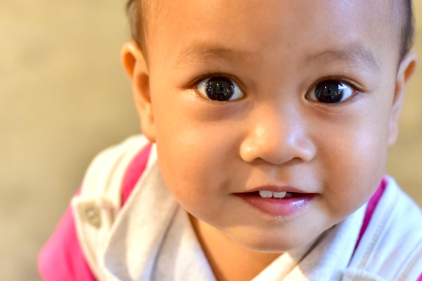 Close up image of a baby girl with teeth at Singing River Dentistry in Athens, AL